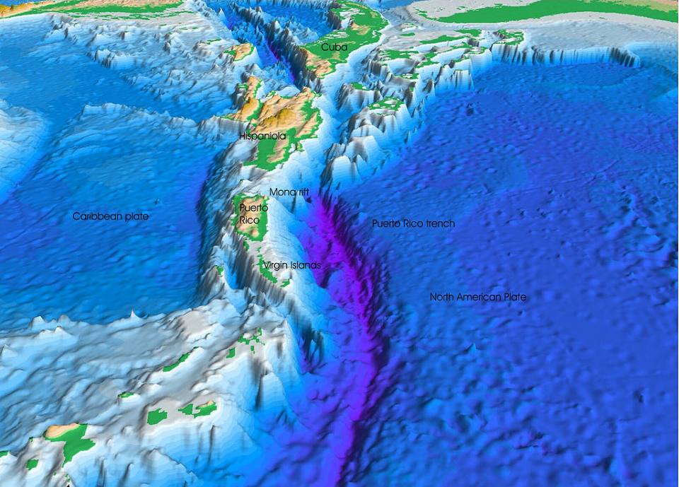 A 3D model of the Puerto Rico Trench, with the Caribbean to the left shown in blue, the trench in thje middle shown in purple and the Atlantic plat to the right shown in blue