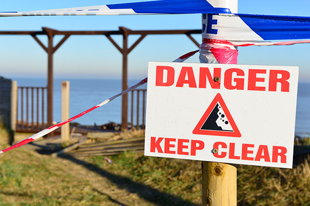 Cordoned off section of road after the storm surge of 15th December 2013 in Hembsy, Norfolk. © P Witney BGS BGS, UKRI